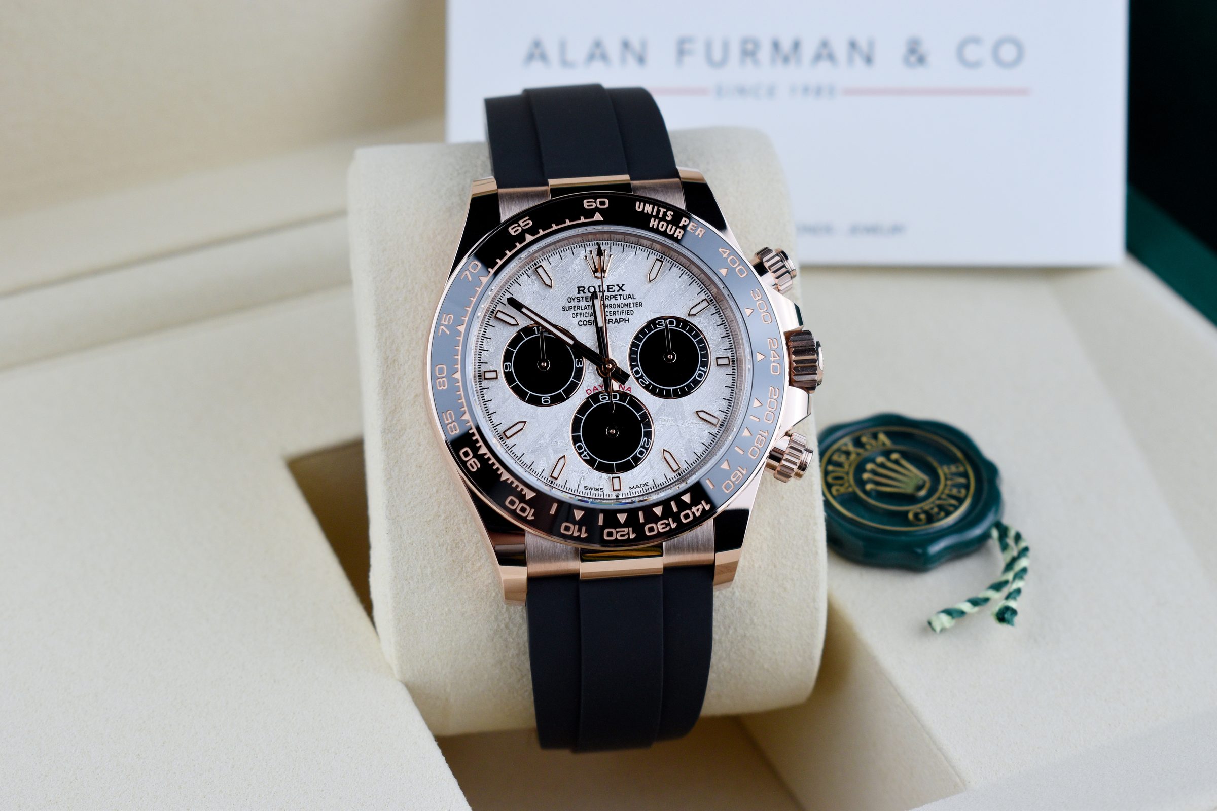Rolex Cosmograph Daytona in Everose gold with a meteorite dial on an Oysterflex bracelet, presented in its box with an Alan Furman & Co card
